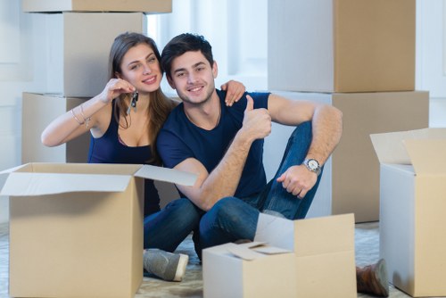 A professional removals team handling furniture in Windsor