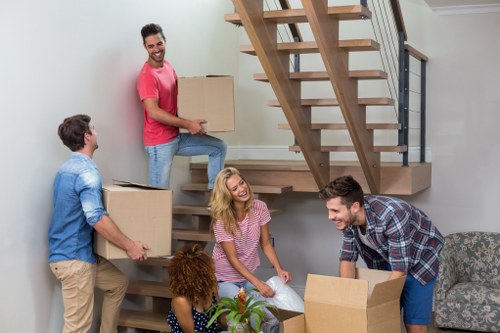 Office relocation planning in Windsor with moving boxes and business furniture
