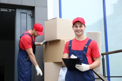 Removals team sorting recyclable items in Windsor