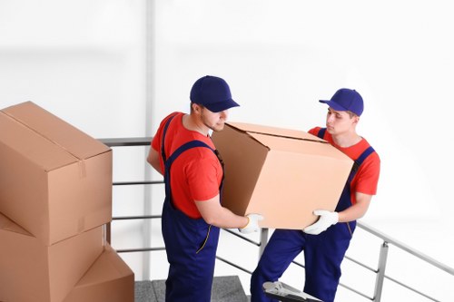 Movers loading household furniture for a Windsor home move