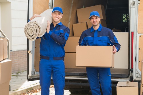 Commercial office relocation support with a moving van in Windsor