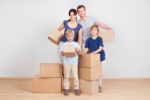 Moving day essentials and prepared boxes for a Windsor house move