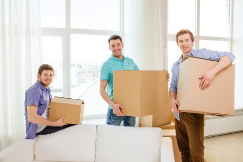 Packed furniture and boxes for a small Windsor flat move