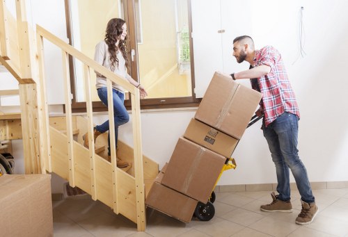 Careful furniture moving inside a Windsor property