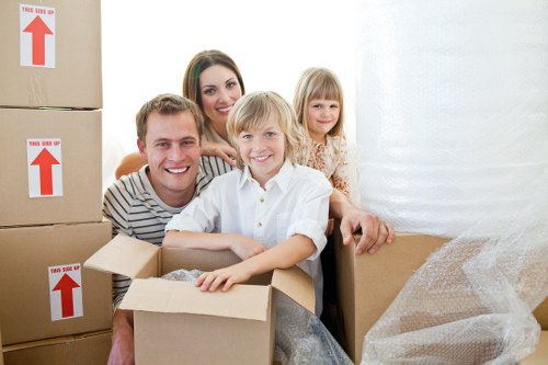 Loading furniture and boxes into a van for a Windsor moving job