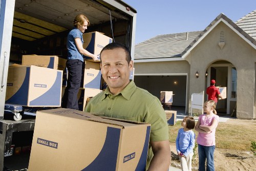 Boxes and reusable household goods prepared for charity donation
